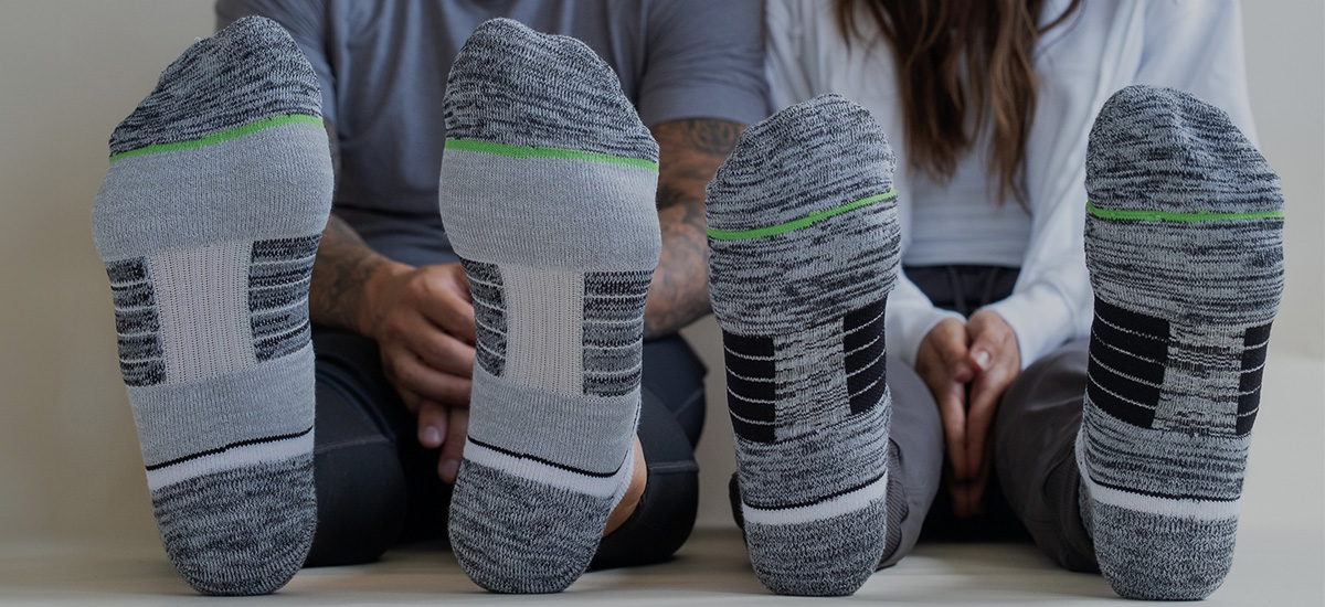 Couple wearing Strideline socks