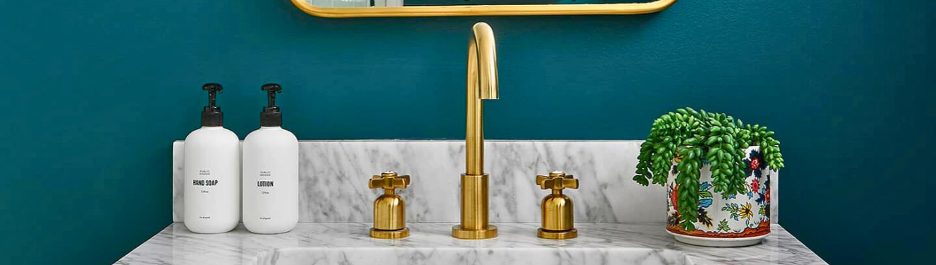 Gold Faucet in bathroom